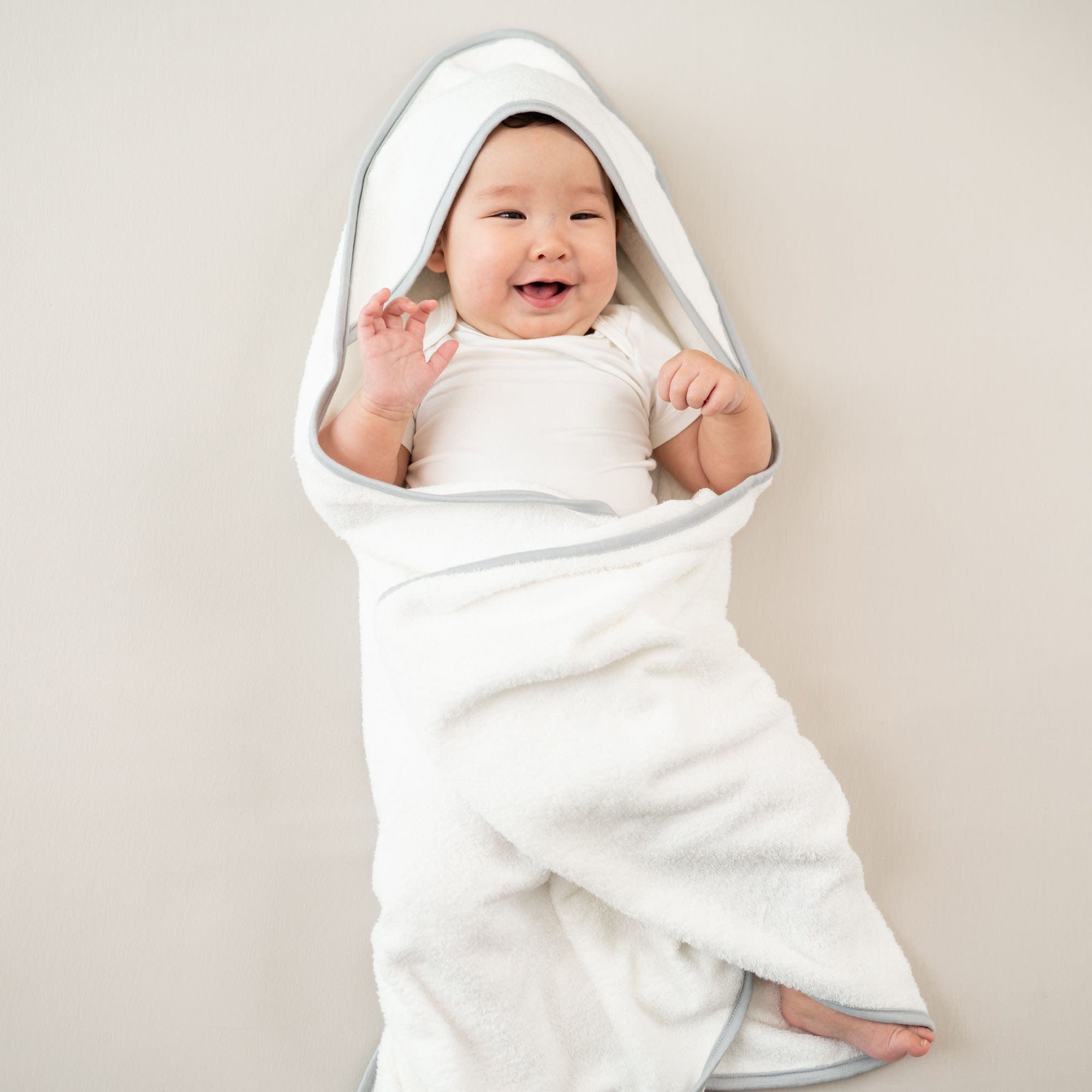 kyte-baby-home-and-bath-cloud-with-storm-trim-infant-hooded-bath-towel-in-cloud-with-storm-trim-32103729266799