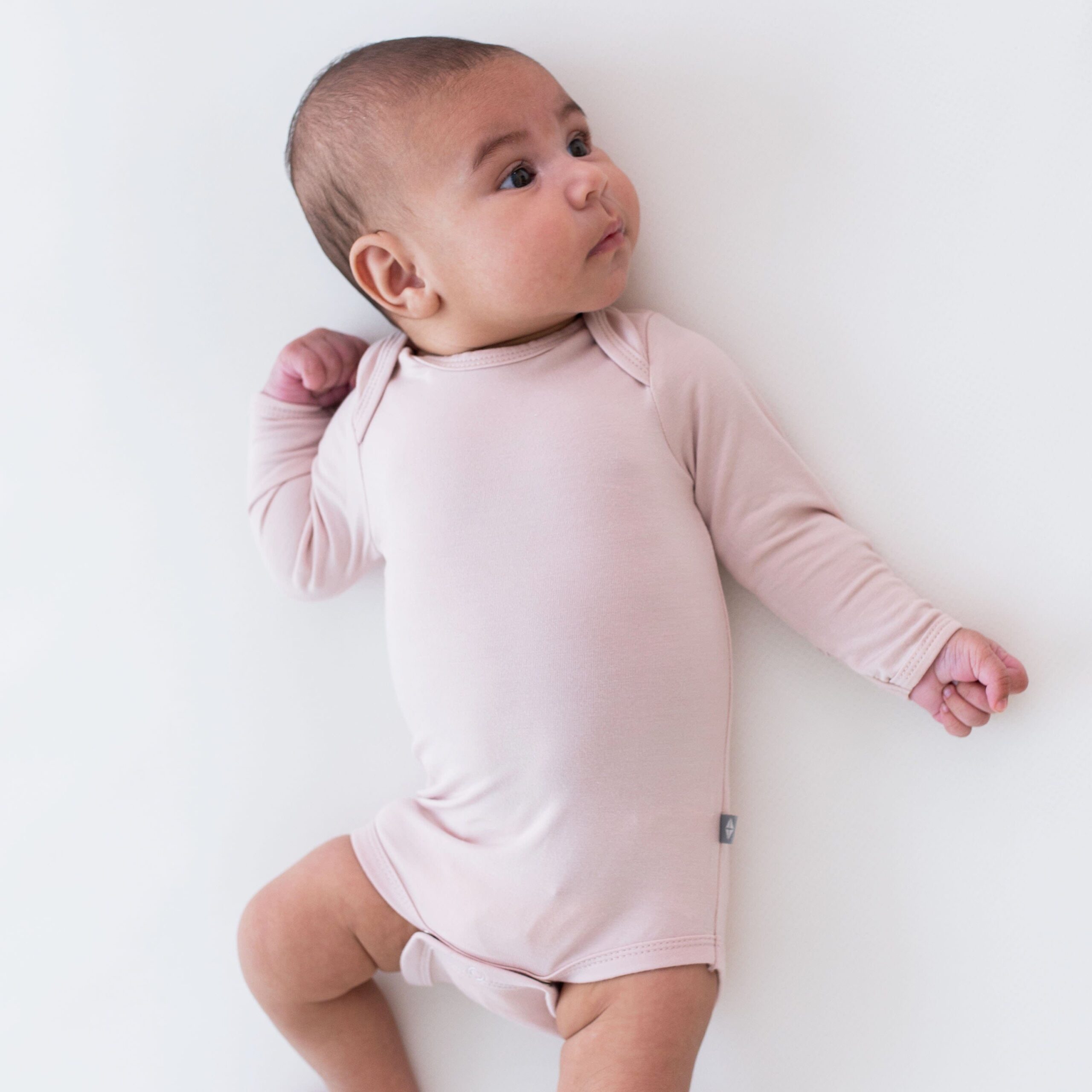 kyte-baby-layette-long-sleeve-bodysuit-in-blush-32733057613935